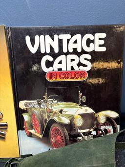 Books on guns and automobiles and suede fringed shawl or collar
