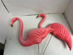 two lawn pink flamingos