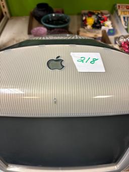 Older apple iMac with keyboard and accessories