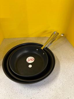 1 all clad skillet, 2 Lagastina skillets