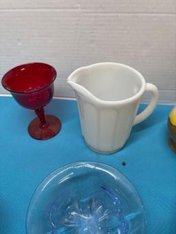 Ruby red glass, green glass, miniature dolls