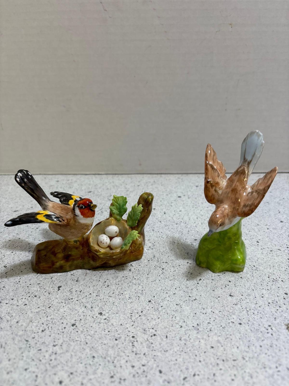 Two crown Staffordshire, bird figurines designed and modeled by JT Jones