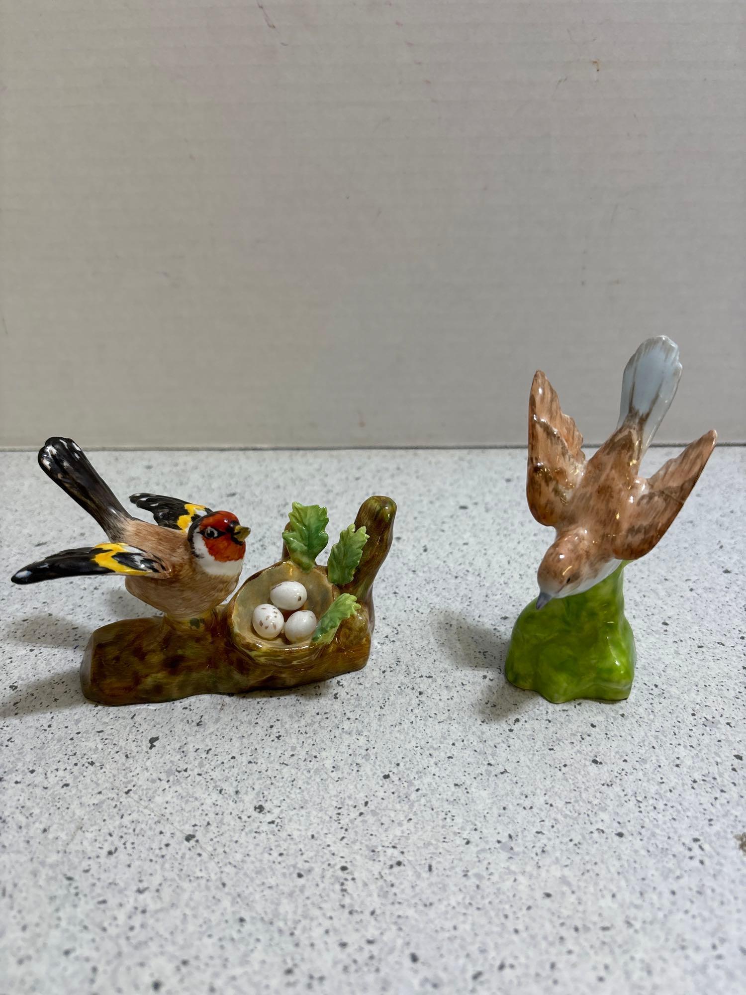 Two crown Staffordshire, bird figurines designed and modeled by JT Jones