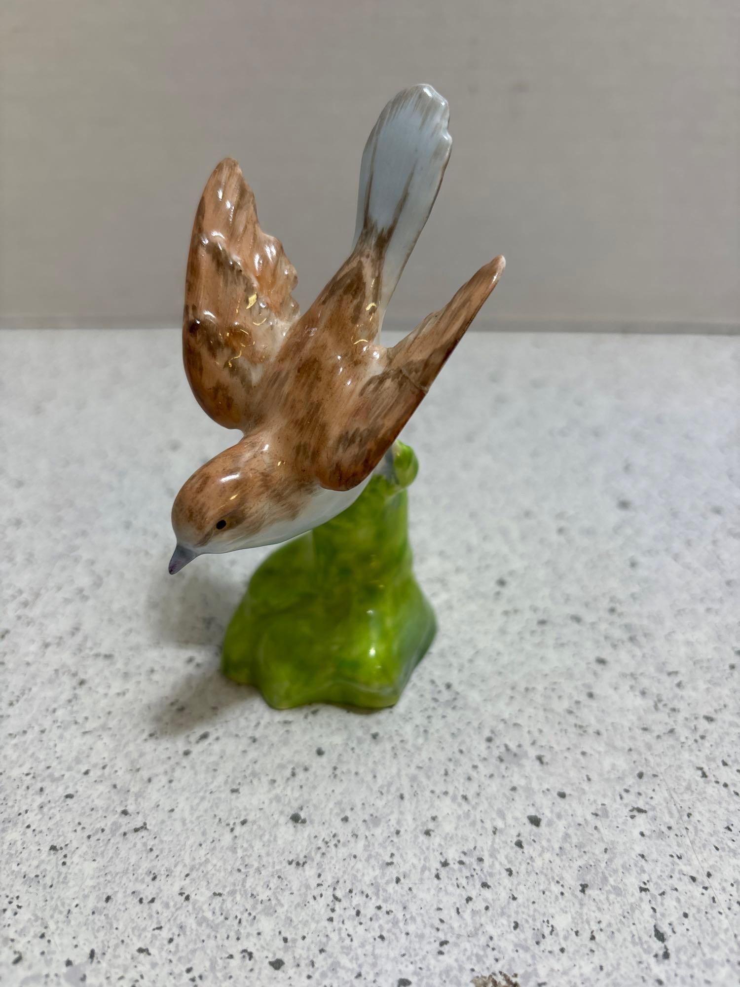 Two crown Staffordshire, bird figurines designed and modeled by JT Jones