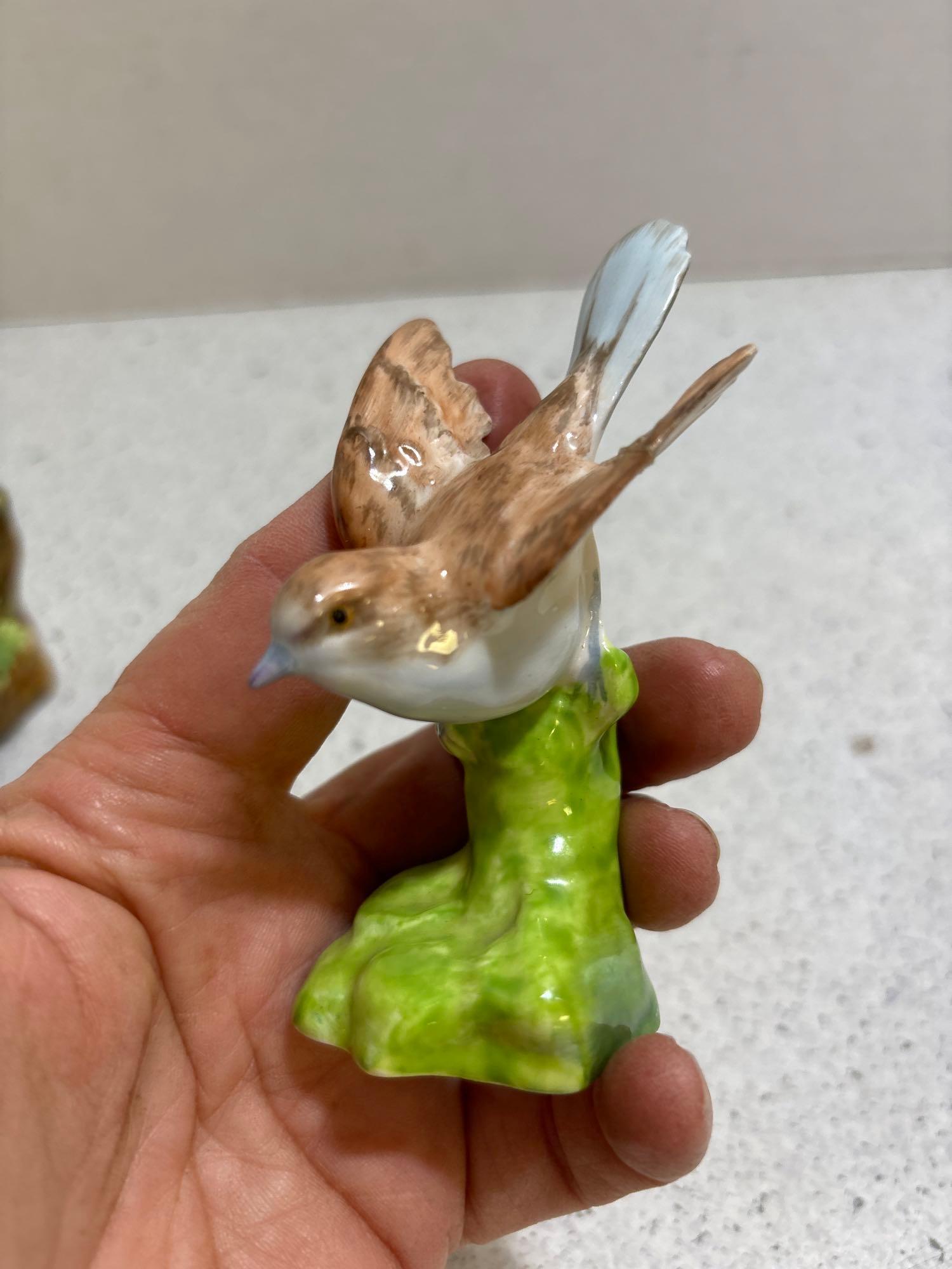 Two crown Staffordshire, bird figurines designed and modeled by JT Jones
