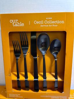 Our table Cecil collection stainless flatware service for four
