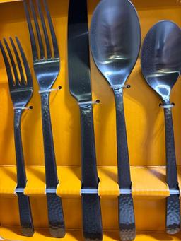 Our table Cecil collection stainless flatware service for four