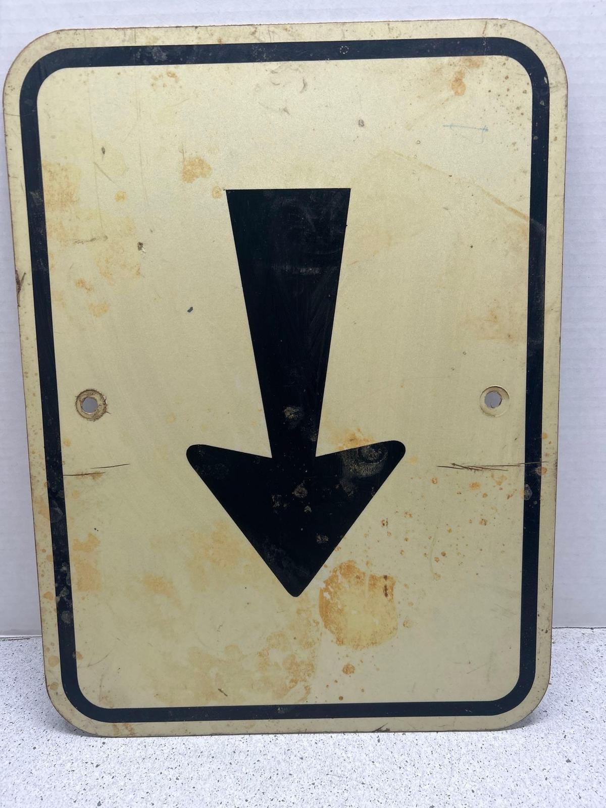 Metal arrow sign