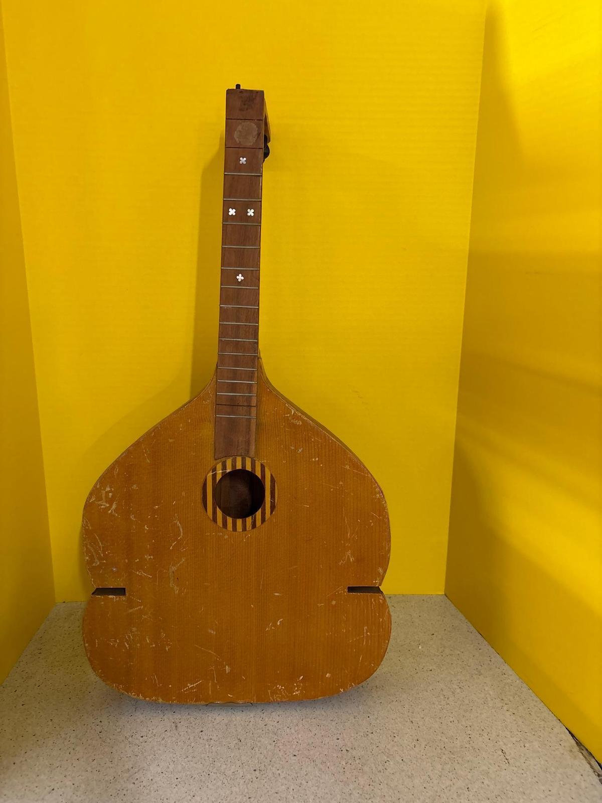 Interesting old wooden lute with eight strings
