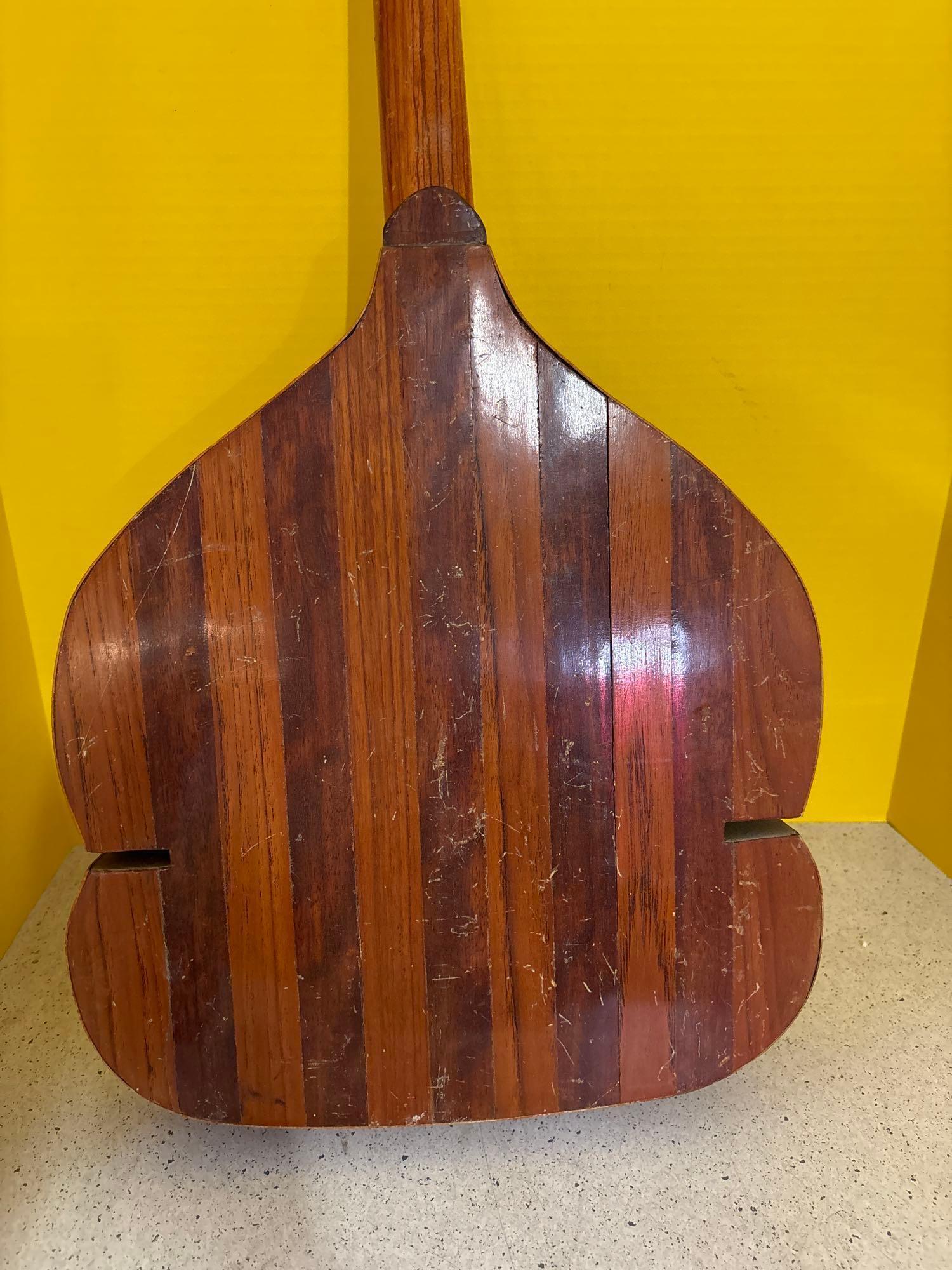 Interesting old wooden lute with eight strings