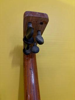 Interesting old wooden lute with eight strings