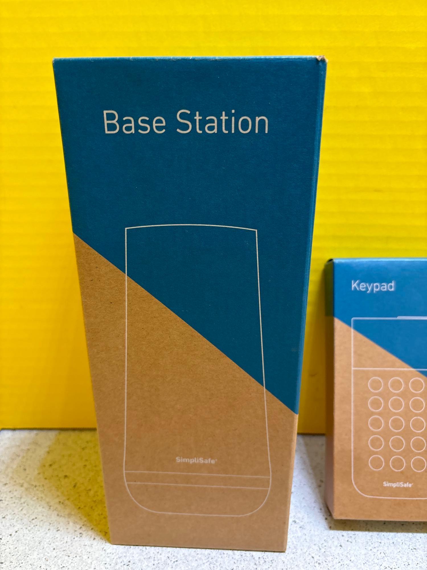Base station, keypad, motion, panic, and entry buttons, yard sign stake