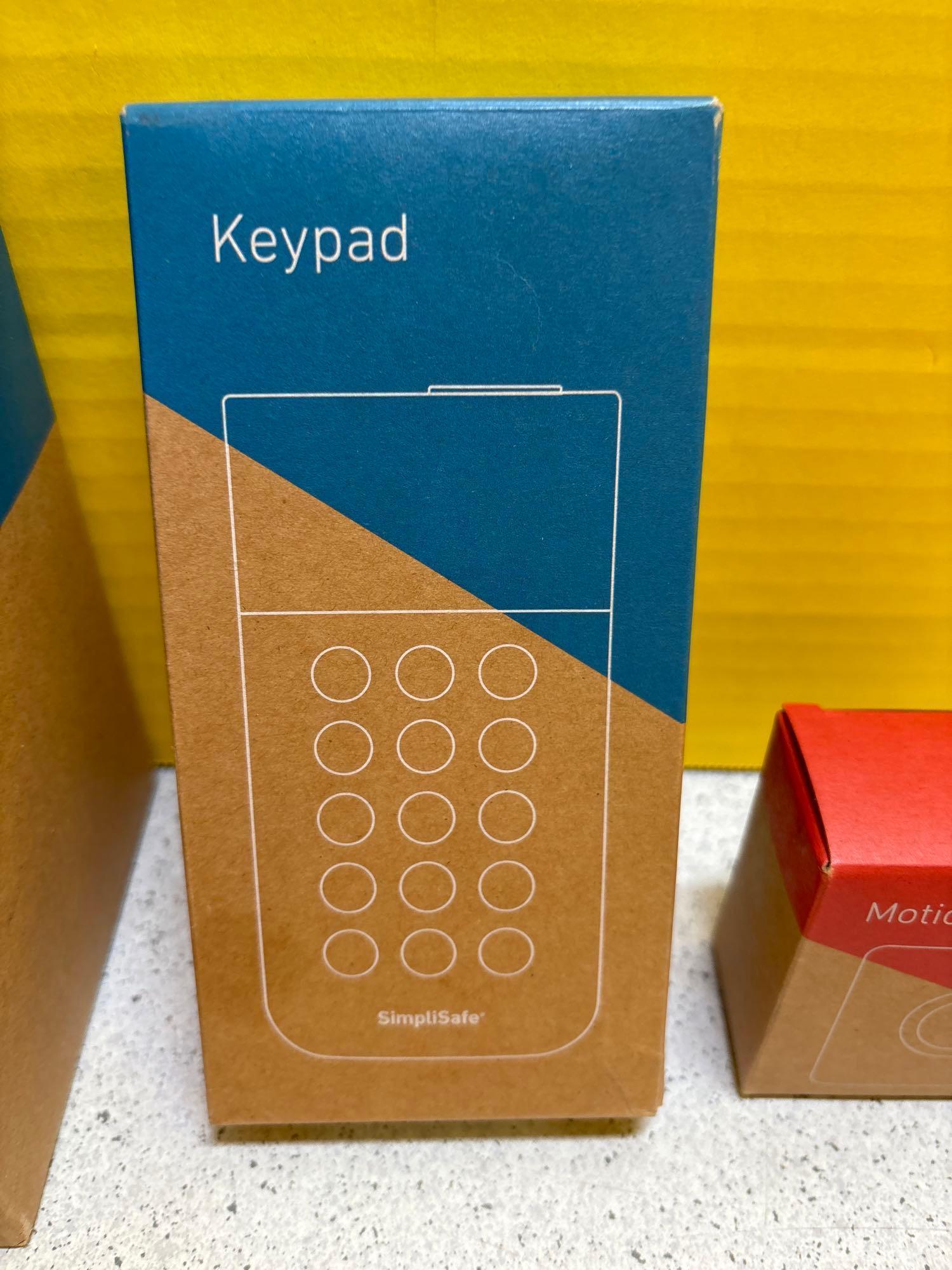 Base station, keypad, motion, panic, and entry buttons, yard sign stake