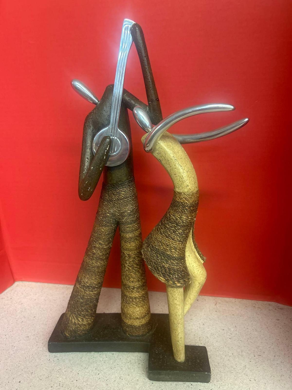 abstract mid century look, mixed media chrome SISAL stone look figures