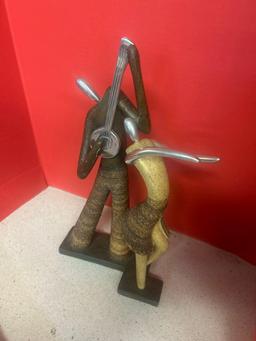 abstract mid century look, mixed media chrome SISAL stone look figures