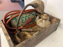 antique license plate, lamp, and glass oil lamp and black and decker air station