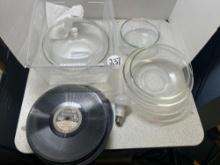 clear glass Pyrex dishes and Edison records