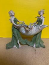 Porcelain lady figurines 10 inches wide 9 inches tall