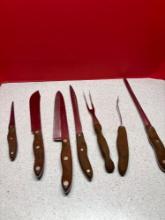 Seven CUTCO utensils