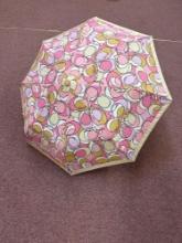 Coach signature logo, pink and beige umbrella