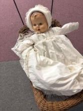 doll in Wicker carriage