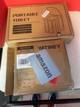 portable toilet and spice rack in boxes