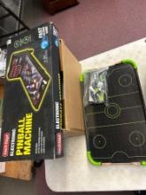 tabletop hockey and electronic pinball