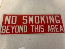 steel sign, no smoking beyond this area