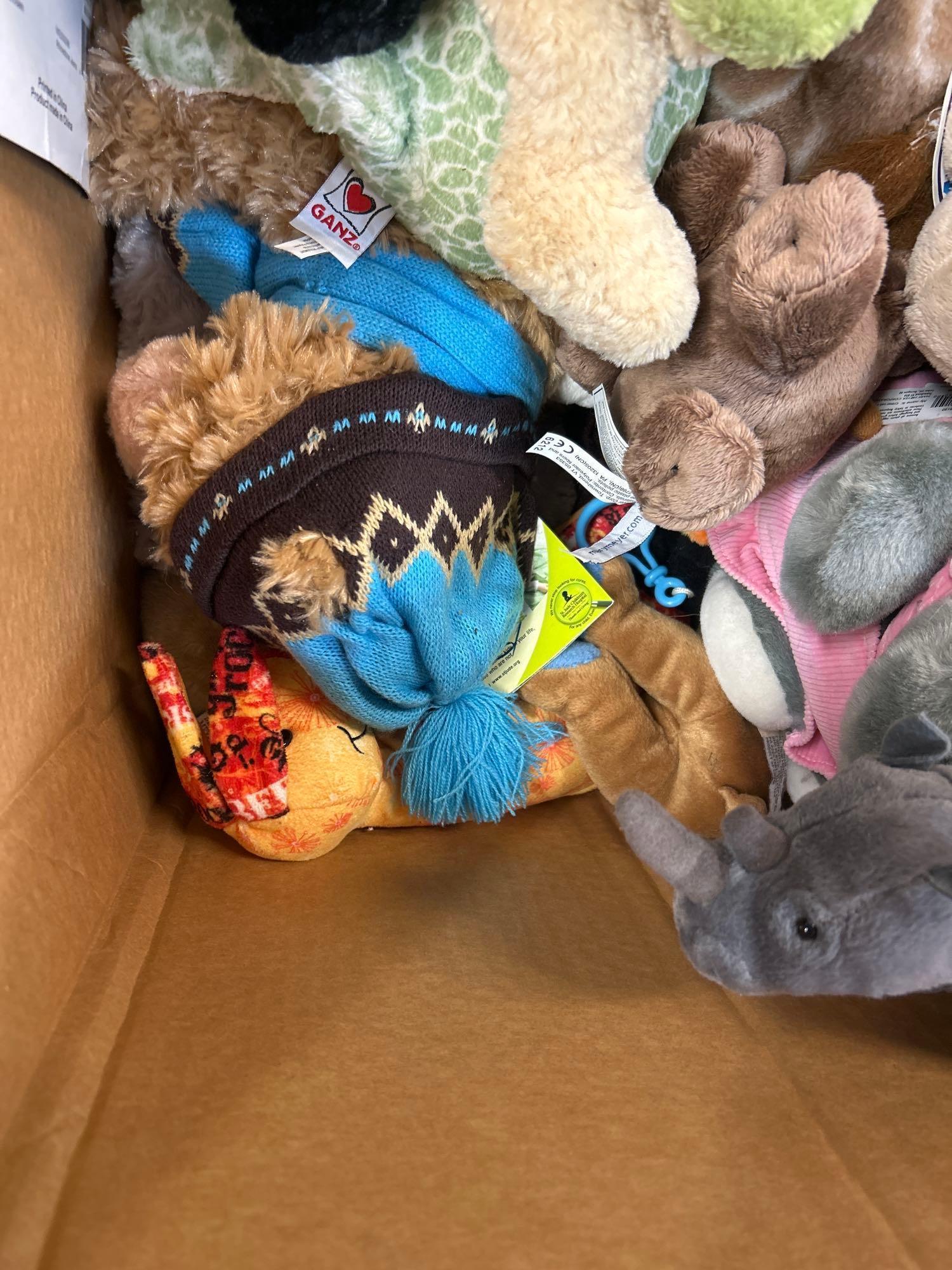 mixed lot of stuffed animals