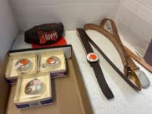 three belts, vintage Cleveland Browns, ornaments, and hat