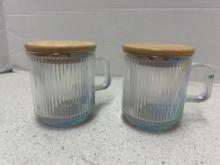 Glass lidded mugs