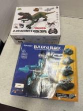 Remote control dinosaur, and building block transmitter toy