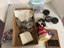 hockey pucks, medals, plaque, etc.