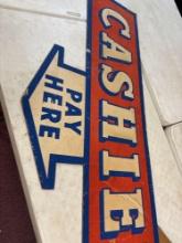 Vintage cardboard cashier pay here sign