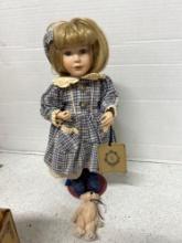 collectible yesterdays child doll on stand