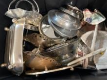 large tote with nice metal cooking and kitchen ware