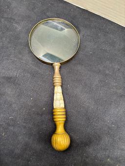 brass handheld magnifying glass