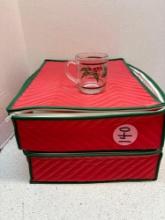 16 glass holiday mugs in storage cases