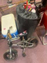 mongoose box racer kids bike and bag of toys mostly plastic baseball bats