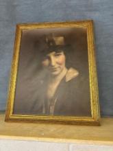 Framed photo of lady and hat