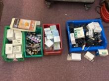 batteries, charging cables, electronics, sticky notes, transformers, etc.