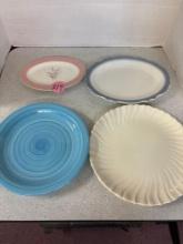 four vintage plates