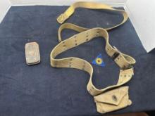 WWII ammo pistol belt with first aid package and 1942 pouch, and US Army belt and NS Meyer brass