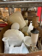 Shelf full of milk glass items, copper molds, other kitchen items
