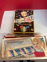 27 Key portable organ and put and take game.