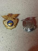 two police hat badges, Ohio and Pennsylvania
