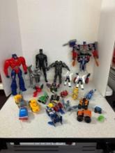 Transformers and other action figure toys, vehicles