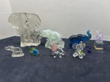 9 glass elephants