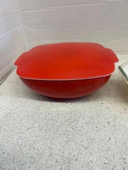 vintage Pyrex red square casserole dish and Pyrex golden acorn divided dish