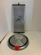 Mack truck mirror and Ford hubcap